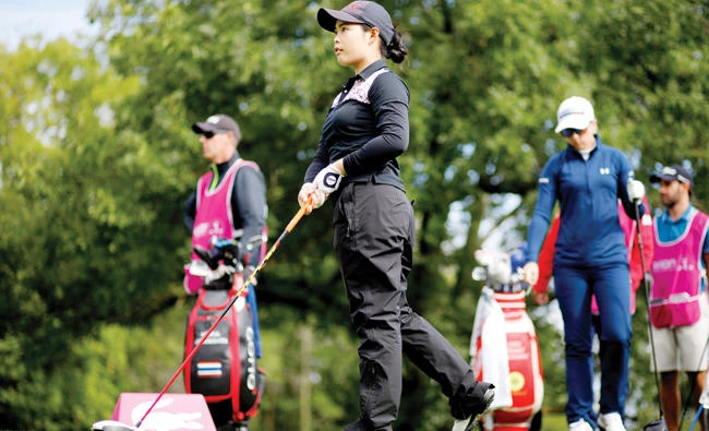 Moriya Jutanugarn, of Thailand, follows her ball after a teeshot on the 18th hole during the second round of the Evian Championship women’s golf tournament in Evian, eastern France, Saturday. (AP)