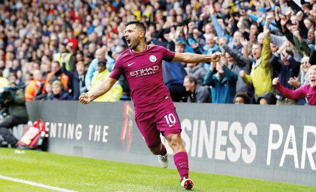 Manchester City’s Sergio Aguero celebrates after scoring their fifth goal completing his hat trick against Watford on Saturday. (Reuters)