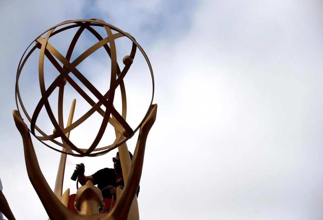 A worker touches up an Emmy statue during preparations for the 69th Emmy Awards at Microsoft Theater in Los Angeles, California, U.S., September 12, 2017. (REUTERS)