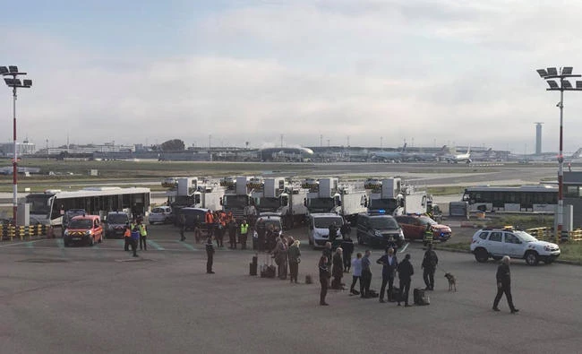 A view of an evacuation of a British Airways airplane at Charles de Gaulle airport in Paris, France on Sunday. (Reuters)