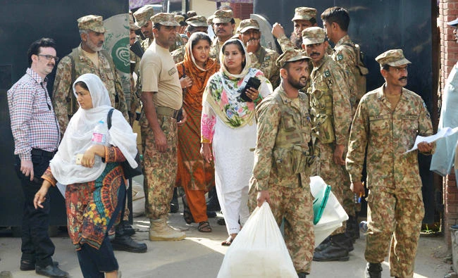 Pakistanis vote for ouster premier’s seat in Parliament