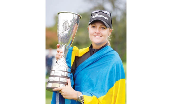 Anna Nordqvist of Sweden with her trophy after winning the Evian Championship women’s golf tournament in Evian, eastern France, on Sunday. (AP)