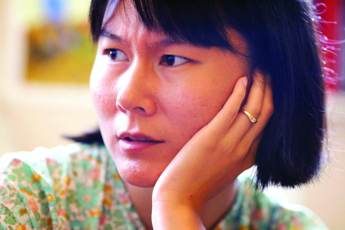 Hua Qu, wife of Princeton University graduate student Xiyue Wang, speaks to Reuters about her husband’s detention in Iran at her home in New Jersey, US. (Reuters)