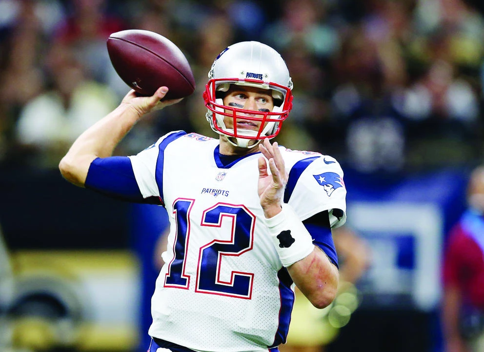 New England Patriots quarterback Tom Brady (12)
makes a throw in the second quarter against the New Orleans Saints at the Mercedes-Benz Superdome on
Sunday. (USA TODAY Sports)