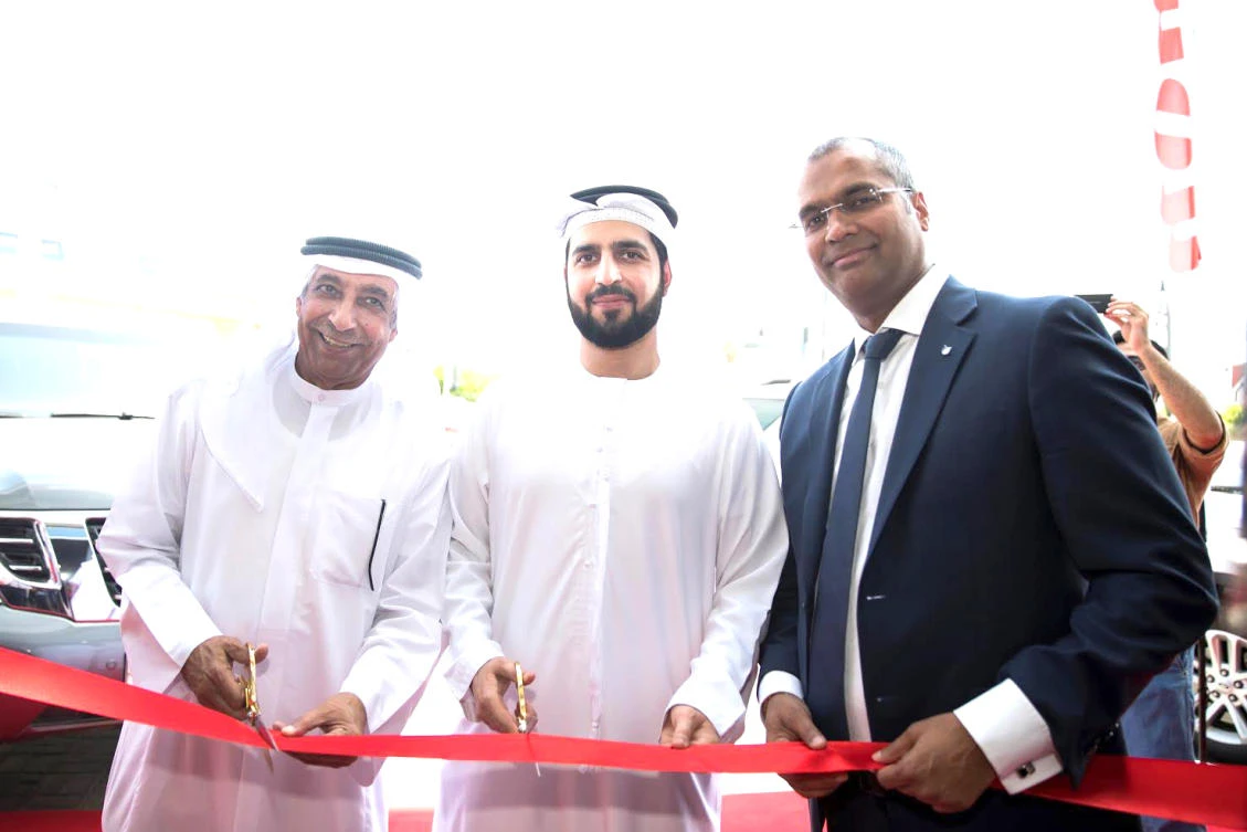 Anurag Agrawal, managing director, Canon Middle East, right, and Ammar Al-Malik, executive director of Dubai Internet City, center, during the opening of Canon’s Innovation Centre in Dubai.