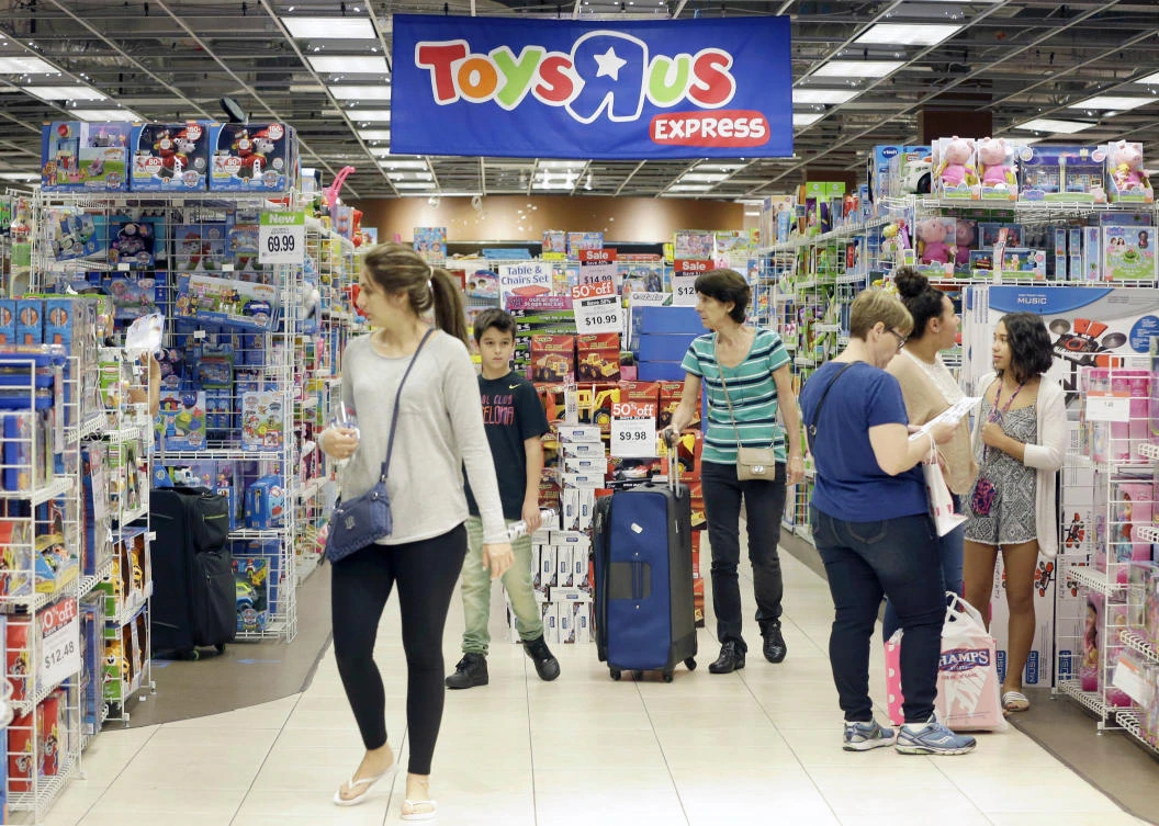Shoppers shop in a Toys R Us store on Black Friday in Miami. (AP)