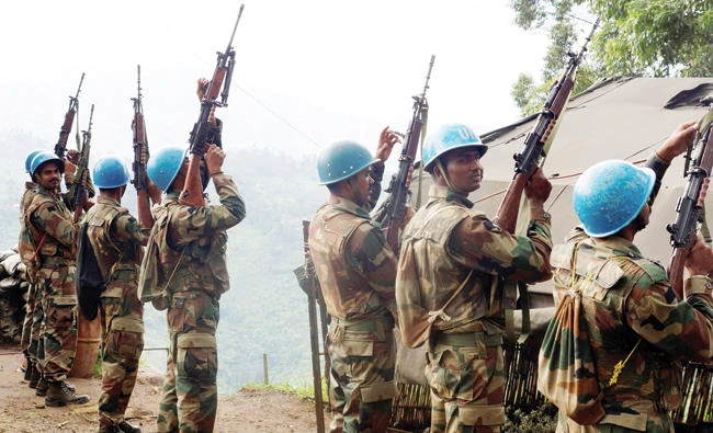 File photo showing Indian soldiers, serving in the UN peacekeeping mission in Congo (MONUSCO), holing up their weapons at their base after patrolling the villages in Masisi, 88 km northwest of Goma. (Reuters)