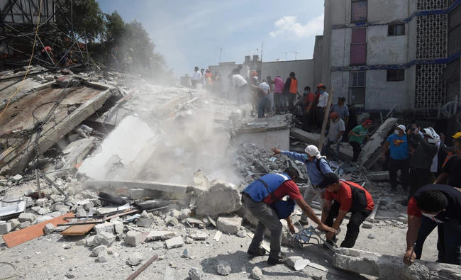 Mexicans dig in rubble seeking survivors as quake kills 225