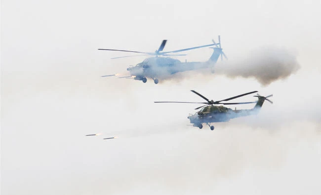 Russian helicopter accidentally fires rocket at onlookers