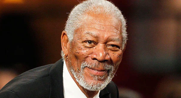 Actor Morgan Freeman stands as he is introduced at the TV Land cable channel taping of the AFI Life Achievement Award honoring actress Shirley MacLaine in Los Angeles, on June 7, 2012. (File photo by Reuters)