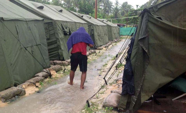 Australian PM says first refugees to be resettled in US under swap deal