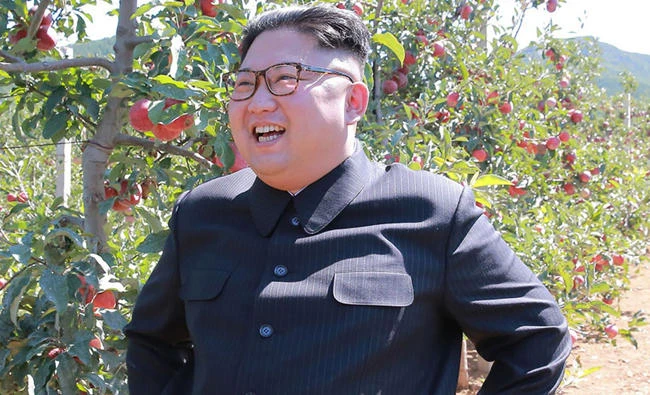 This undated photo released from North Korea's official Korean Central News Agency (KCNA) on Thursday shows North Korean leader Kim Jong-Un visiting a fruit farm at Kwail-up County, South Hwanghae Province. (AFP)