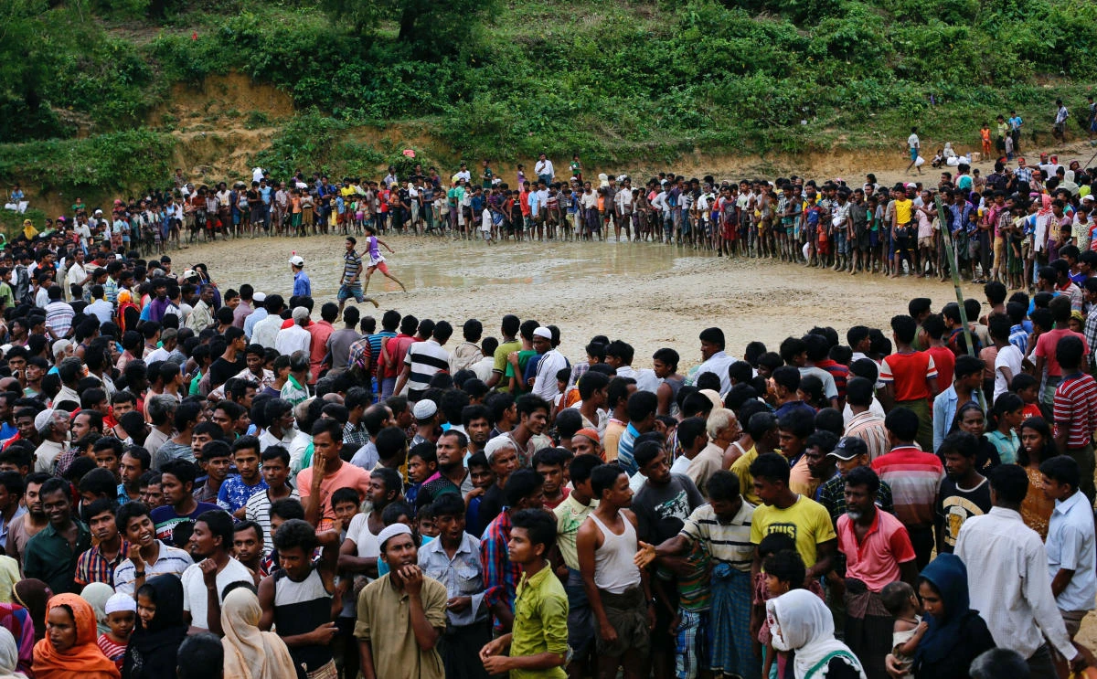Rohingya refugees wait for aid in Cox’s Bazar, Bangladesh. (Reuters)