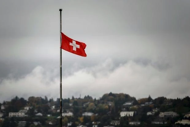 Swiss flag is seen flying. (AFP)
