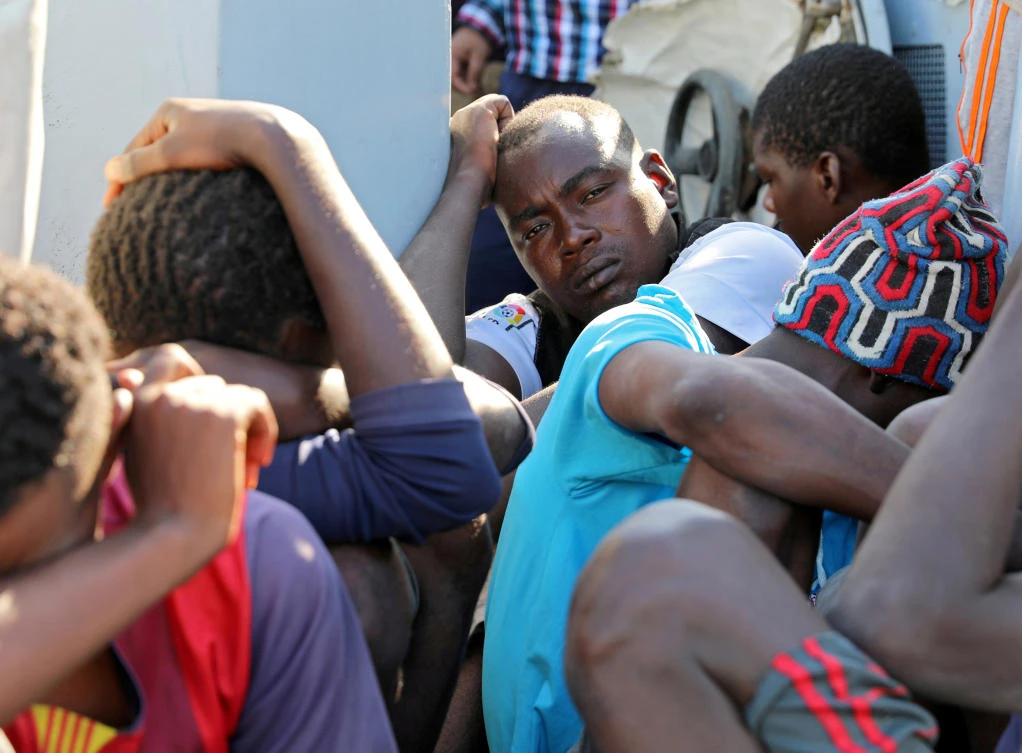 Migrants in a boat arrive at a naval base after they were rescued by Libyan coast guard, in Tripoli, Libya, on August 29, 2017. (File photo by Reuters)
