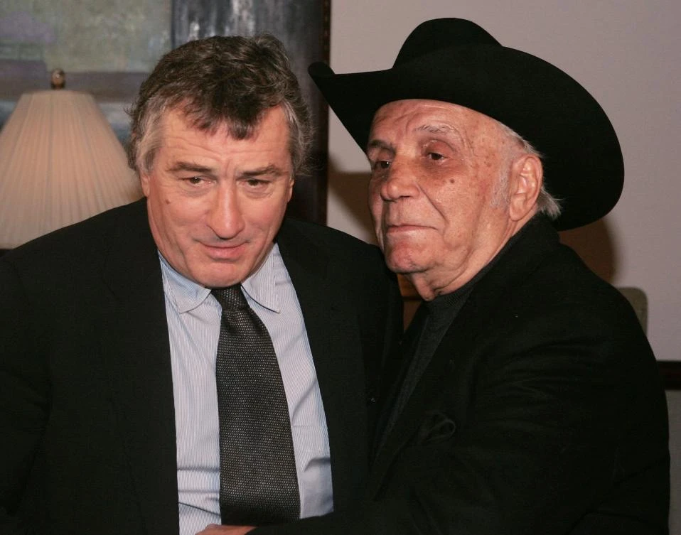 This file photo shows boxer Jake LaMotta and actor Robert De Niro attending a special screening of “Raging Bull” to celebrate its 25th anniversary and DVD release in New York, on January 27, 2005. (File photo by AFP)