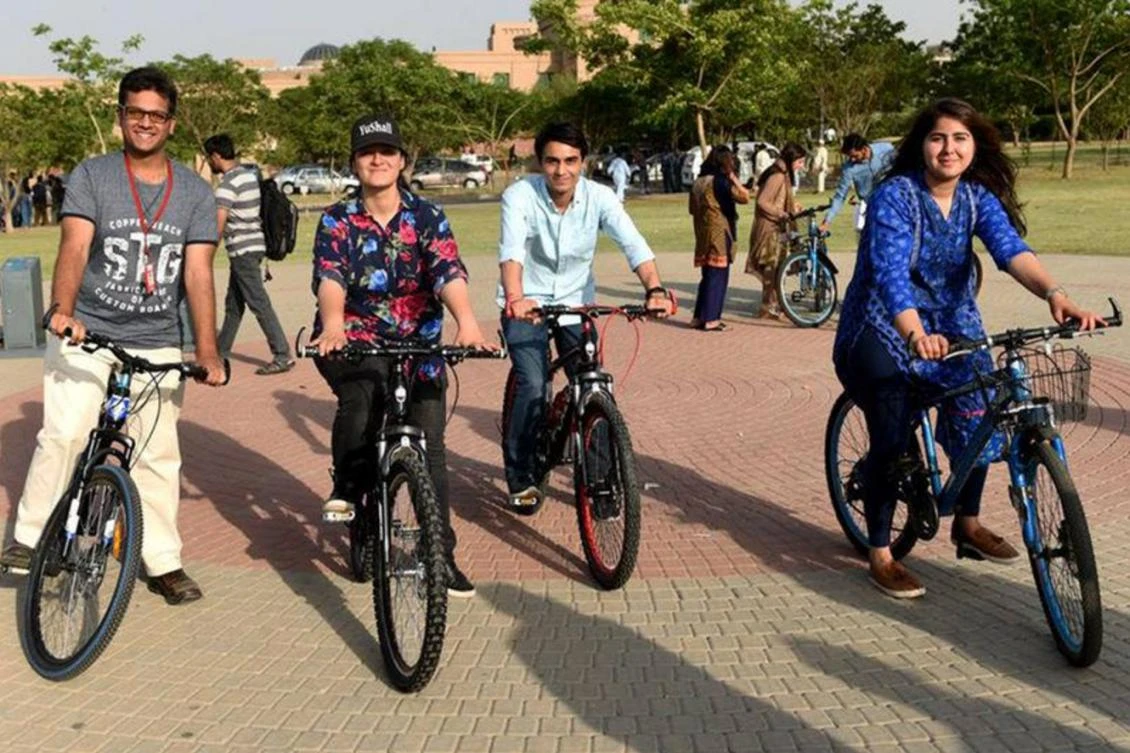 A group of students riding bikes at the soft launch of CYKIQ at NUST campus, Islamabad, Pakistan, on May 10, 2017. (File photo: CYKIQ via Reuters)