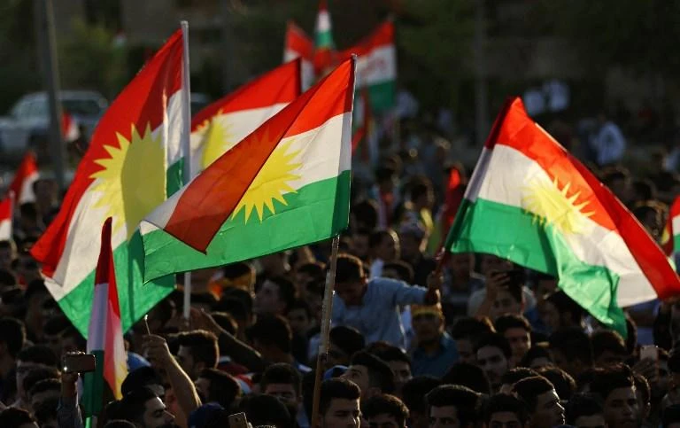 Iraqi Kurds gather in the street flying Kurdish flags as they urge people to vote in the upcoming independence referendum in Arbil, the capital of the autonomous Kurdish region of northern Iraq, on September 13, 2017. (AFP)