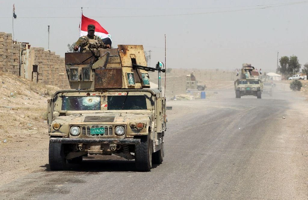 Iraqi pro-government forces reach al-Sejar village on the boundary of Fallujah, on May 28, 2016, as they take part in a major assault to retake the city from the Islamic State group
Iraqi pro-government forces reach al-Sejar village on the boundary of Fallujah, on May 28, 2016, as they take part in a major assault to retake the city from the Islamic State group (AFP)