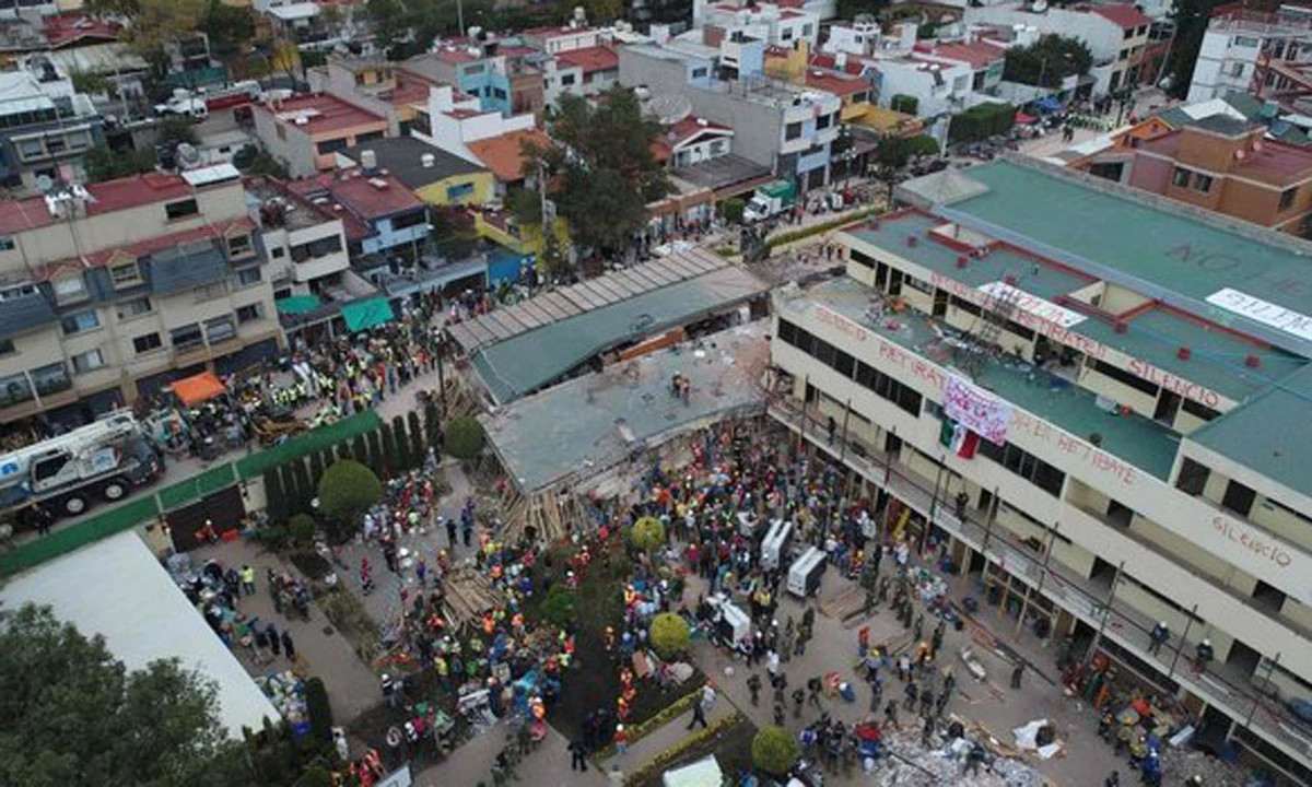 Mexican rescue teams look for people trapped in the rubble at the Enrique Rebsamen elementary school, above, in Mexico City. (AFP)