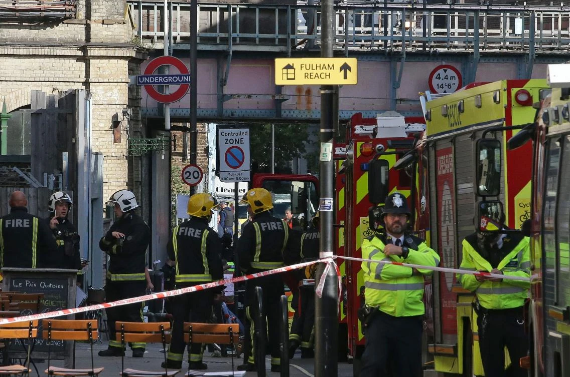 Members of the emergency services work outside Parsons Green underground tube station in west London. (AFP)