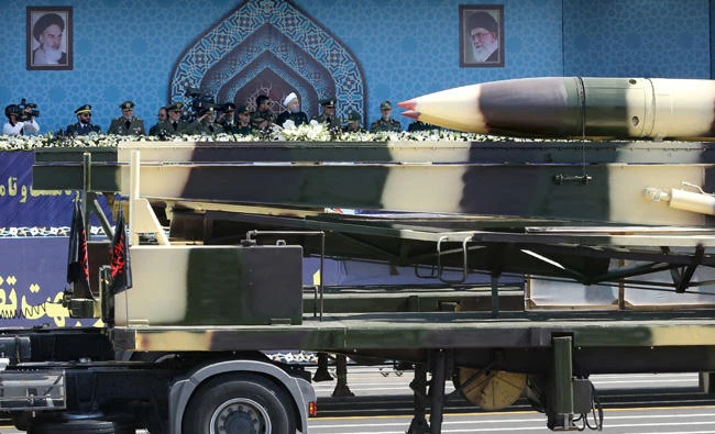 Missiles are displayed as Iranian President Hassan Rouhani attends an armed forces parade in Tehran on September 22, 2017. (President.ir/Handout via Reuters)