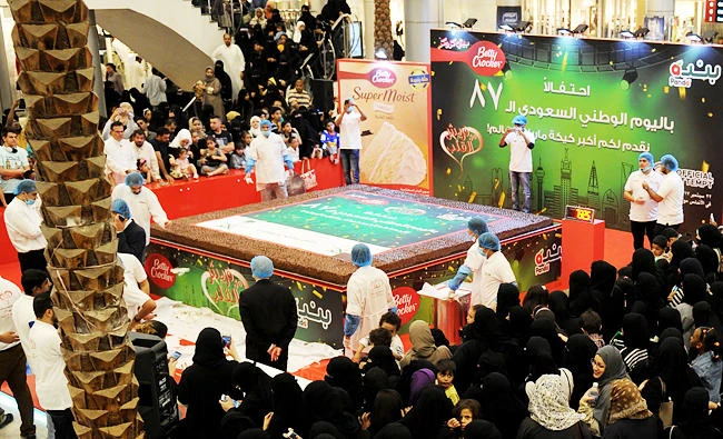 Saudis try to break the Guinness World Records title for the largest marble cake on Friday, in the city of Jeddah. (AFP)