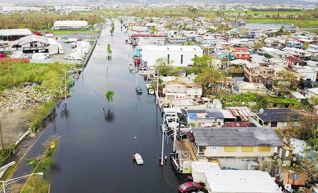 Dam failing as scope of Puerto Rico’s disaster becomes clear