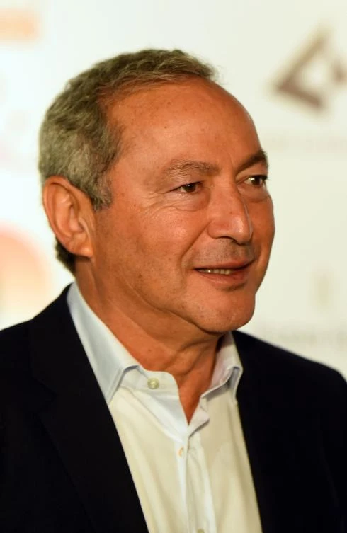 Egyptian businessman Samih Sawiris attends the "Night of Art" exhibit at the the Egyptian Museum in the capital Cairo on October 28, 2017. / AFP / MOHAMED EL-SHAHED