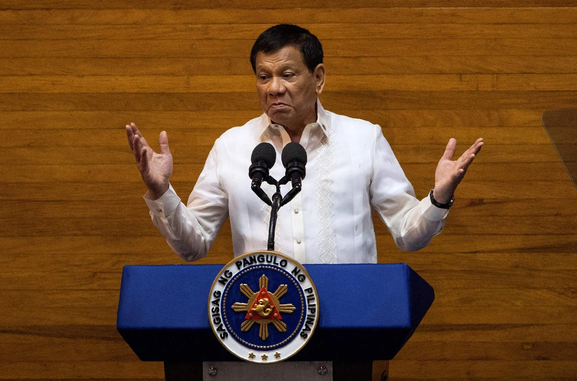This file photo shows Philippine President Rodrigo Duterte gesturing as he delivers his state of the nation address at Congress in Manila on July 24, 2017. (File photo by AFP)