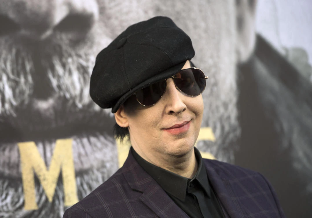 This file photo shows Singer/Musician Marilyn Manson attending the world premiere of “Arthur: Legend of the Sword” at the TCL Chinese Theatre in Hollywood, California on May 8, 2017. (File photo by AFP)