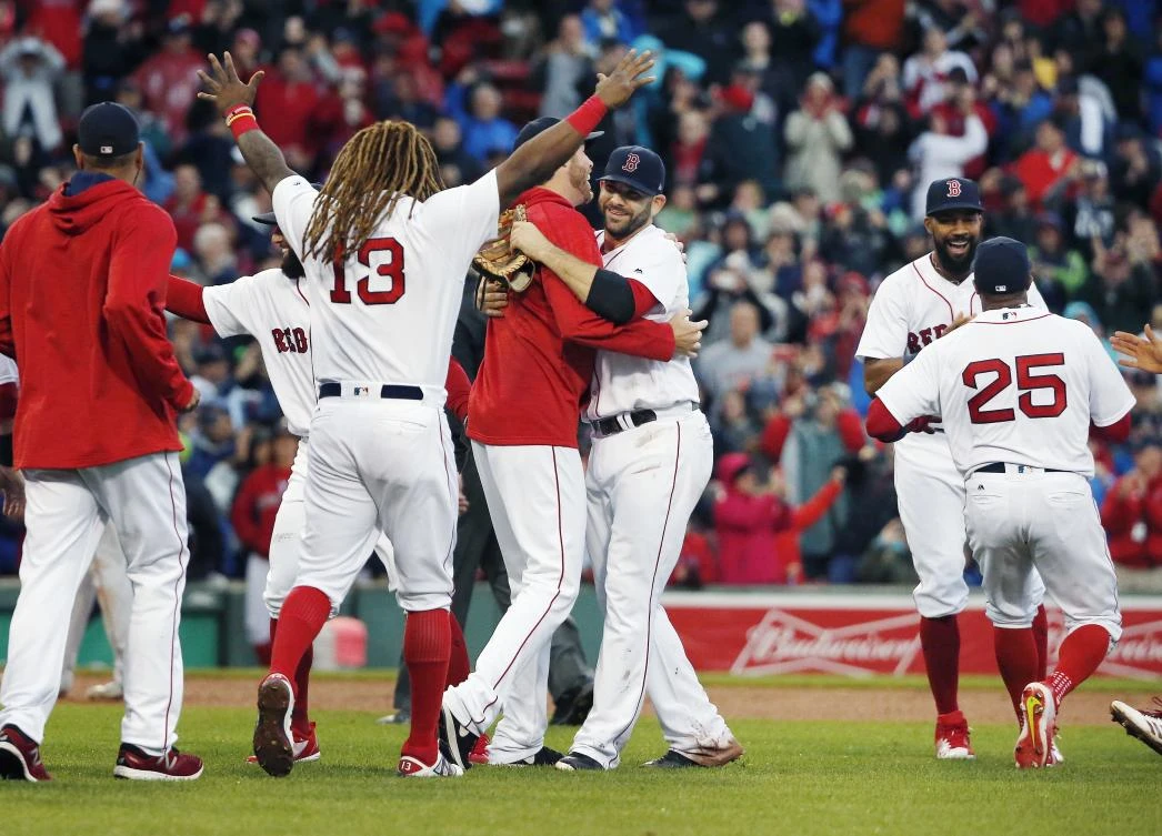 The Boston Red Sox celebrate after defeating the Houston Astros 6-3 in a baseball game and clinching the American League East Division championship in Boston, Saturday, September 30, 2017. (File photo by AP)