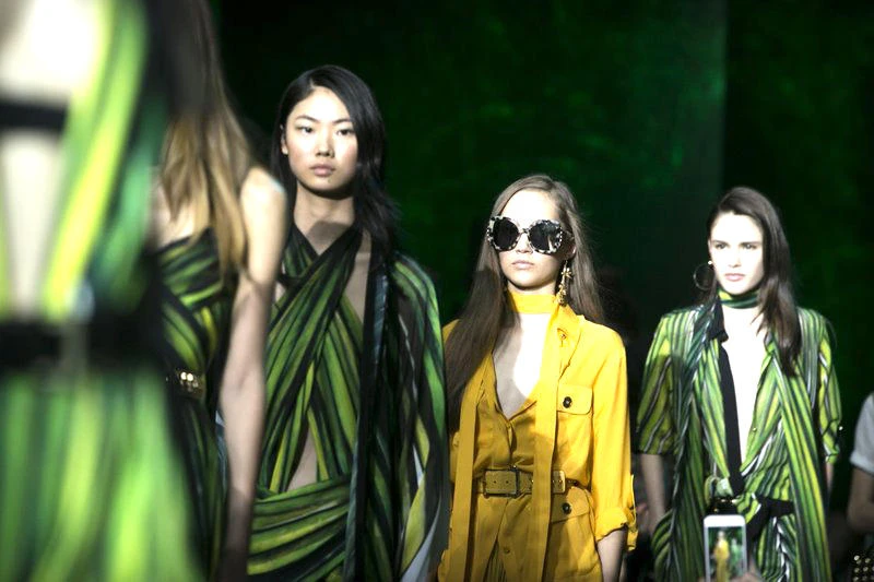 Models wear creations for Elie Saab’s Spring-Summer 2018 ready-to-wear fashion collection presented in Paris. (AP)