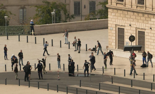 Police, victim and assailant are seen on the site of the attack at Saint-Charles station in Marseille, France, on October 1, 2017 in this picture obtained from social media. (Paul-Louis Leger/NEWZULU/via REUTERS)