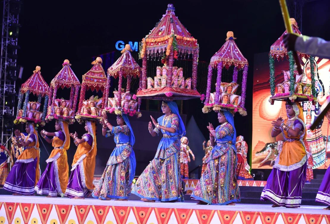 This file photo shows Indian folk dancers performing during the Vibrant Navratri Mahotsav festival at GMDC Ground in Ahmedabad on September 21, 2017. (File photo by AFP)