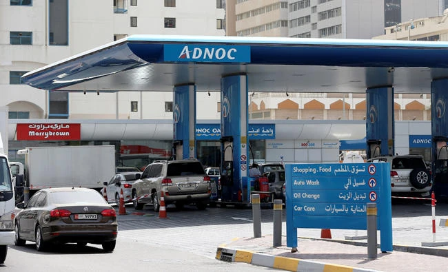 Cars are seen an ADNOC petrol station in Abu Dhabi, United Arab Emirates, in this July 10, 2017 photo. (REUTERS)