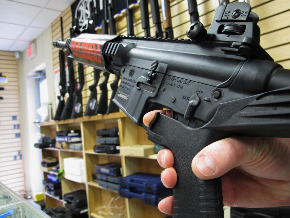 In this file photo, an employee of North Raleigh Guns demonstrates how a ‘bump’ stock works. The gunman in Las Vegas on Monday, Oct. 2, 2017 used a ‘bump-stock’ for two of his weapons. (AP)
