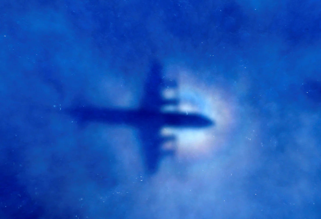 The shadow of a Royal New Zealand Air Force (RNZAF) P3 Orion maritime search aircraft can be seen on low-level clouds as it flies over the southern Indian Ocean looking for missing Malaysian Airlines flight MH370 March 31, 2014. (Reuters)