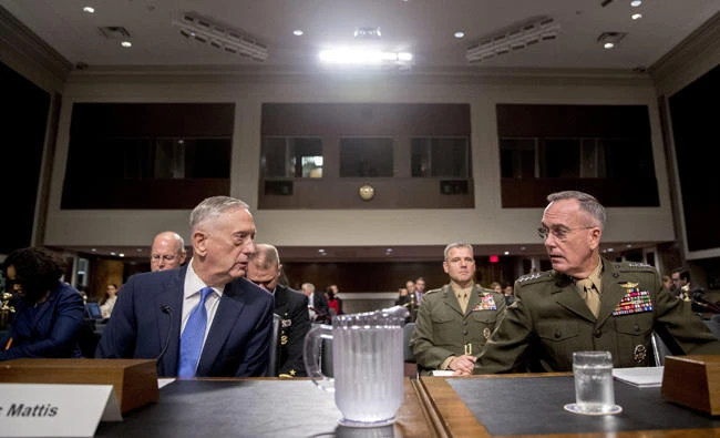 Defense Secretary Jim Mattis, left, and Joint Chiefs Chairman Gen. Joseph Dunford, right, testify before the Senate Armed Services Committee on Capitol Hill in Washington on Tuesday, Oct. 3, 2017. (AP Photo/Andrew Harnik)