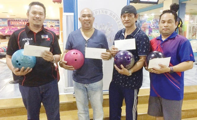 Men’s division winners, from left, Sergio Mondar, Ed Cordova, Rico Bulalayao and Benj Espinosa.