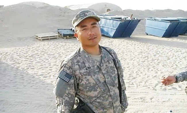 In this undated file photo courtesy of Chong Kim provided by his attorney Tim Warden-Hertz, Chong Kim poses for a photo in National Guard fatigues.(AP)
