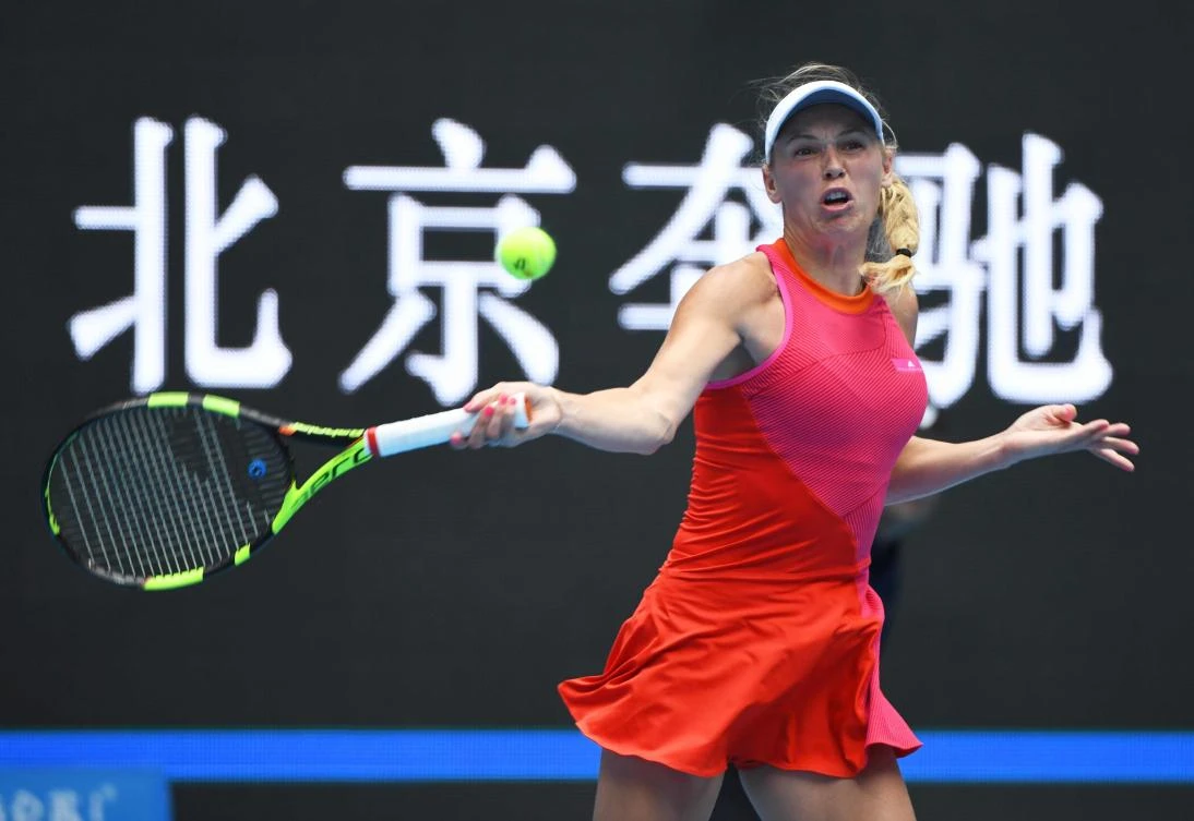 Caroline Wozniacki of Denmark hits a return during her women’s singles match against Wang Qiang of China at the China Open tennis tournament in Beijing on Oct. 1, 2017. (AFP/Greg Baker)