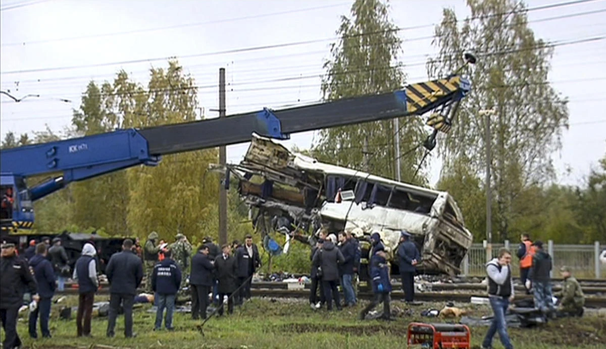 At least 16 killed as train hits bus in Russia