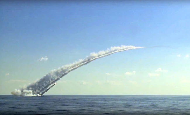 This frame grab provided on Thursday, Oct. 5, 2017, by Russian Defense Ministry press service, showing what they say is a long-range Kalibr cruise missile launched by the a Russian submarine in the Mediterranean. (Russian Defense Ministry Press Service photo via AP)
