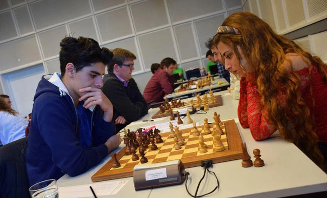 Dorsa Derakhshani (right) competing at an international chess tournament in Oslo. Norway, in 2016. (Courtesy: Tarjei J. Svensen via Twitter)