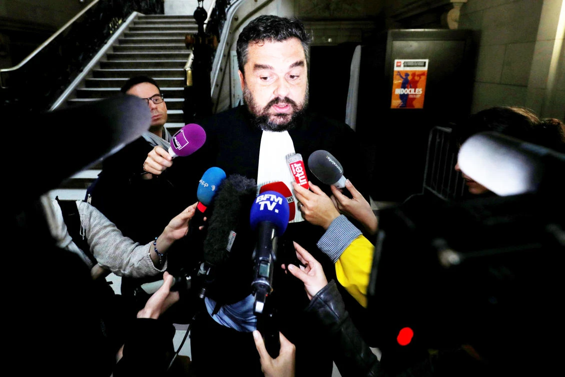Thomas Klotz, French lawyer for Christine Riviere, a radicalized mother known as “Mama Jihad,” talks to journalists as he arrives at the courthouse in Paris. (Reuters)