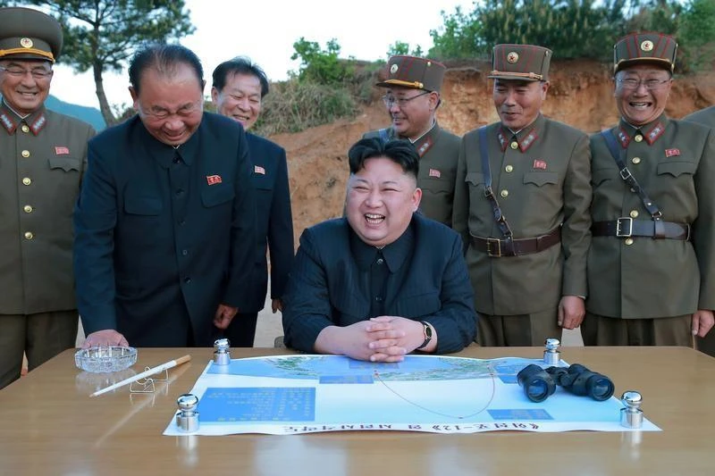 North Korean leader Kim Jong Un reacts during the long-range strategic ballistic rocket Hwasong-12 (Mars-12) test launch in this undated photo released by North Korea’s Korean Central News Agency on May 15, 2017. (KCNA via Reuters)