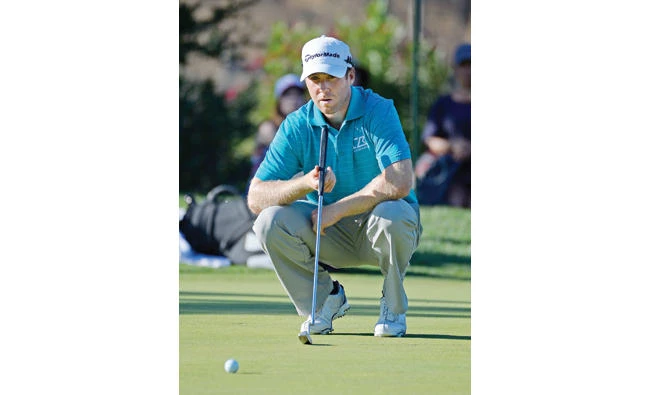 Tyler Duncan lines up a putt on the third hole during the second round of the Safeway Open at the North Course of the Silverado Resort and Spa on Friday in Napa, California. (AFP)