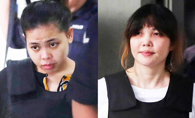 This combination of Oct. 2, 2017 photos shows Indonesian Siti Aisyah, left, and Vietnamese Doan Thi Huong, right, escorted by police as they leave a court hearing in Shah Alam, Malaysia, outside Kuala Lumpur. (AP)