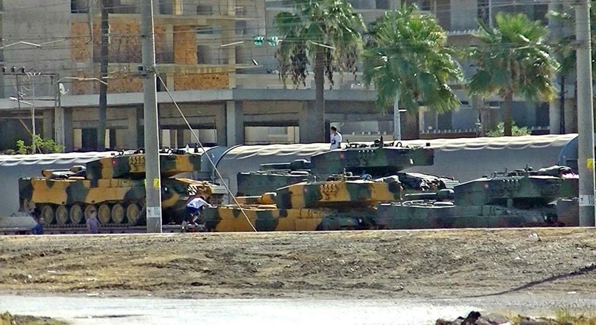 Turkish tanks arrive at the Iskenderun train-port on October 7 at Iskendurun district in Hatay. (AFP/Dogan News Agency)
